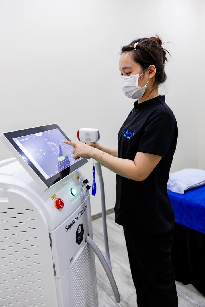 Eternal specialist adjusting Diode Laser settings for each treatment area